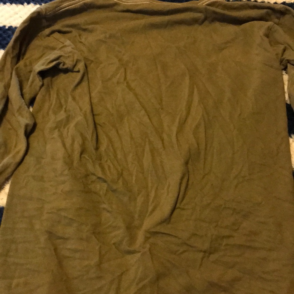A olive green long sleeve with pink writing - Picture 3 of 3